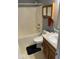 Gray bathroom featuring a shower and tub combo, toilet, oak cabinet, and single sink vanity at 13660 N Ayrshire Cir, Camby, IN 46113
