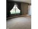 Bedroom with dark walls and a large window at 13660 N Ayrshire Cir, Camby, IN 46113