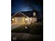 Charming brick two-story home with attached two car garage, landscaped yard, and inviting curb appeal at 13660 N Ayrshire Cir, Camby, IN 46113