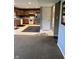 Spacious kitchen with wood cabinets, stainless steel appliances, and a gray accent wall at 13660 N Ayrshire Cir, Camby, IN 46113