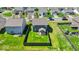 Aerial view of home showcasing fenced backyard and covered patio at 159 Longleaf Ln, Greenfield, IN 46140