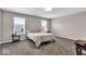 Spacious bedroom with carpet floors, two windows and neutral colors offering a serene atmosphere at 159 Longleaf Ln, Greenfield, IN 46140