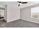 Bedroom with carpeted floors, bright natural light, and a ceiling fan at 159 Longleaf Ln, Greenfield, IN 46140