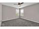 Bedroom featuring carpeted floors, two windows for natural light, and neutral walls at 159 Longleaf Ln, Greenfield, IN 46140