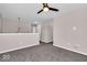 Loft area with carpeted floors, natural light, neutral walls, and access to other rooms at 159 Longleaf Ln, Greenfield, IN 46140