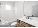 Well-lit bathroom showcasing a tub and shower combination with a white subway tile surround at 17354 Ditch Rd, Westfield, IN 46074