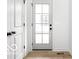 Bright entryway featuring a white door, and modern fixtures at 17354 Ditch Rd, Westfield, IN 46074