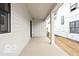 Exterior of home featuring a covered patio space with a concrete surface at 17354 Ditch Rd, Westfield, IN 46074