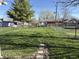 Expansive backyard with lush green grass is perfect for outdoor activities and relaxation at 1804 W 15Th St, Muncie, IN 47302