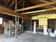 Exposed beam garage interior, a handyman's dream with ample workshop space at 1804 W 15Th St, Muncie, IN 47302