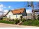 Charming home featuring updated roof, siding, and landscaping at 2025 Barth Ave, Indianapolis, IN 46203