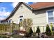 Inviting front entrance with a small porch, greenery, and a decorated front yard at 2025 Barth Ave, Indianapolis, IN 46203