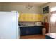 Kitchen featuring light countertops and colorful cabinet and trim at 2025 Barth Ave, Indianapolis, IN 46203