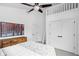 Modern bedroom with high ceilings, neutral color scheme, and ample closet space at 2134 N New Jersey St, Indianapolis, IN 46202