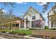 Charming two-story home with manicured lawn and mature trees at 2134 N New Jersey St, Indianapolis, IN 46202