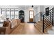 Stylish living room with hardwood floors, modern furnishings, and natural light from ample windows at 2134 N New Jersey St, Indianapolis, IN 46202