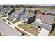 Attractive aerial view of homes with diverse colors, neat lawns, sidewalks and street in a well-organized neighborhood at 2250 Egbert Rd, Westfield, IN 46074