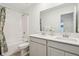 Clean bathroom with double sinks, a shower-tub combo, white cabinets, and neutral countertops offering style and functionality at 2250 Egbert Rd, Westfield, IN 46074