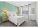 Charming bedroom with patterned wallpaper, a comfortable bed, and a bright window at 2250 Egbert Rd, Westfield, IN 46074