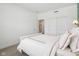 Clean bedroom with a white bed, ample closet space, and neutral walls at 2250 Egbert Rd, Westfield, IN 46074