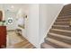 Entry hallway with stylish decor, hardwood floors, and staircase leading to upper level at 2250 Egbert Rd, Westfield, IN 46074