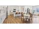 Bright kitchen with a large island, modern appliances, and a dining area with stylish seating at 2250 Egbert Rd, Westfield, IN 46074