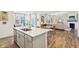 Stylish open concept kitchen flowing to dining and living areas, with ample natural light at 2250 Egbert Rd, Westfield, IN 46074