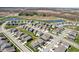 Wide aerial shot of the neighborhood highlighting the ponds and common areas at 2250 Egbert Rd, Westfield, IN 46074