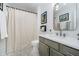 Well-lit bathroom with a shower/tub, stylish vanity, and updated fixtures at 2263 N Delaware St, Indianapolis, IN 46205