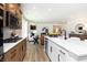 Gourmet kitchen with stainless appliances, granite countertops and open to living area at 261 Onset Way, Westfield, IN 46074
