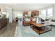 Spacious living room featuring natural light, an open floor plan, and hardwood flooring at 261 Onset Way, Westfield, IN 46074
