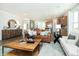 Bright and airy living room showcasing modern decor and a seamless connection to the kitchen at 261 Onset Way, Westfield, IN 46074