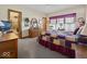 Bedroom featuring comfortable carpet, cozy quilt, and decorative accents at 2810 Winterway Dr, Shelbyville, IN 46176