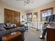 Cozy living room featuring comfortable seating, natural light from windows, and wood accents throughout the space at 2810 Winterway Dr, Shelbyville, IN 46176