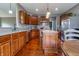Well-appointed kitchen featuring stainless steel appliances, granite countertops, and custom cabinetry at 2890 Trillium Way, Columbus, IN 47201