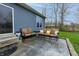 Cozy patio featuring two sofas, two chairs, and direct backyard access at 2890 Trillium Way, Columbus, IN 47201
