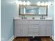 Beautiful bathroom features a double sink vanity with ample cabinet space at 3015 S Rybolt Ave, Indianapolis, IN 46241