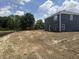 Large backyard ready for landscaping, perfect for outdoor activities and entertaining, with a newly built home at 3297 Godby Dr, Sheridan, IN 46069
