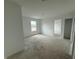 Bright bedroom with a window and neutral walls, offering a blank canvas for personalization at 3297 Godby Dr, Sheridan, IN 46069