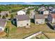 The backyard features a well-maintained lawn, wooden fence, and mature trees at 3529 Miesha Dr, Indianapolis, IN 46217