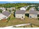 The backyard features a well-maintained lawn, wooden fence, and mature trees at 3529 Miesha Dr, Indianapolis, IN 46217
