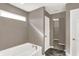 The spacious bathroom features a soaking tub and an open doorway to a closet at 3529 Miesha Dr, Indianapolis, IN 46217