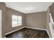 Neutral bedroom with window, carpet flooring, and freshly painted walls at 3529 Miesha Dr, Indianapolis, IN 46217