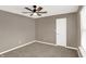 The bedroom has neutral walls, plush carpeting, and a modern ceiling fan at 3529 Miesha Dr, Indianapolis, IN 46217