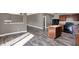 Spacious layout from living area into the kitchen with hardwood floors and a large island for added counter space at 3529 Miesha Dr, Indianapolis, IN 46217