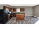 Well-equipped kitchen with an island, plenty of cabinet space, and stainless steel appliances creating a functional design at 3529 Miesha Dr, Indianapolis, IN 46217