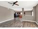 Bright, open floor plan with a ceiling fan, seamless transition to the kitchen, and modern finishes throughout at 3529 Miesha Dr, Indianapolis, IN 46217