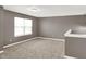 Well-lit loft space with neutral walls and carpet at 3529 Miesha Dr, Indianapolis, IN 46217
