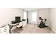 Bedroom featuring a workspace setup, with a desk, computer, and an exercise bike by the window at 3650 Tipperlin Rd, Bargersville, IN 46106