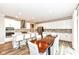 Bright kitchen features a large island, updated appliances, and seamless dining space at 3650 Tipperlin Rd, Bargersville, IN 46106